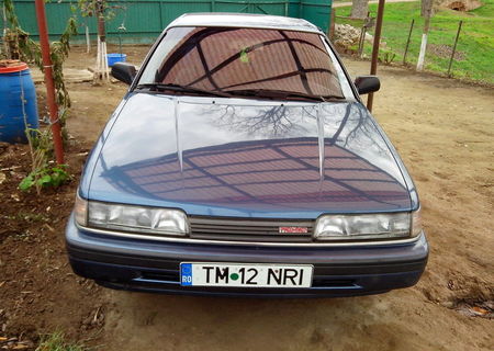 Mazda 626,an 1990