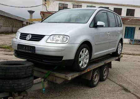 VW Touran TDI 136 CP adus de curand din Germania