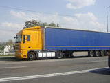 ansamblu cap tractor DAF si semiremorca SCHMITZ, photo 1