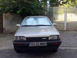 mazda 323 an 1990