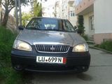 vand kia carens LS, photo 1