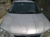 vand mazda 323f, anul 2001